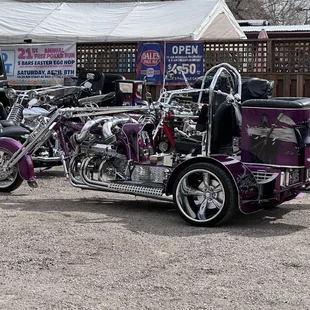 a purple motorcycle with a side car