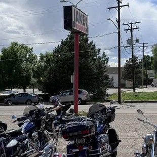 motorcycles parked in a parking lot