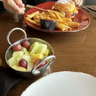 Brunch burger, fries and side of fruit