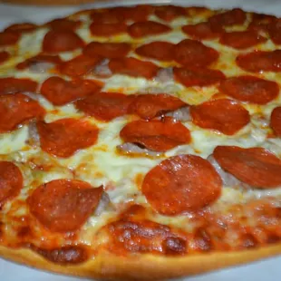 Oven Combo- Sausage, pepperoni, onions, mushrooms and green olives.