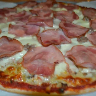 House Special- loaded with 9 ingredients this pizza is delicious!