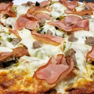 House Special- with nine ingredients this pizza will satisfy the hungriest of people.