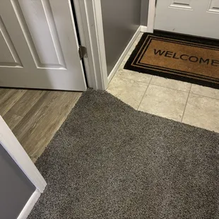 This carpet had to be dried after the flood and restretched and cut to look good again.