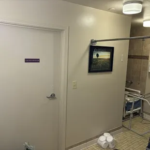 This was a complete tear out of a cast iron tub and shower in a nursing home and built this storage room and new tiled shower.