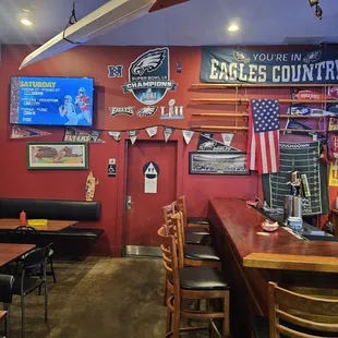 a bar with tables and chairs