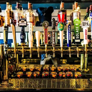 LIBATIONS -12 Drafts, Canned Beers, Variety of Wines and House-made Cocktails.