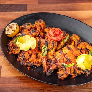Seafood Bhaja Platter- Fish, Shrimp,&amp; Squid (d,s)Spice blend of coastal orissa region char-grilled seafood,
roasted yukon potatoes,lemon &amp;