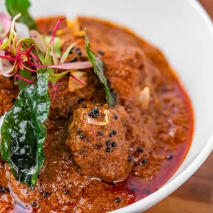 Kodagu - Lamb (d,h) 
Indulge in the robust and intricately flavored coorgi lamb,
a karnataka regional delicacy, perfectly seasoned with o