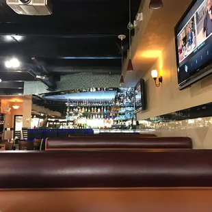 Booths facing toward bar.