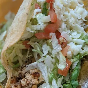 Chicken Taco - so good.  Crunchy shell, moist &amp; tender ground chicken, fresh veg, lots of cheese.  This is a great taco.