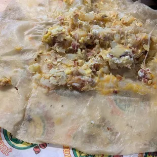 Special burrito. Eggs, cheese, bacon, potato.