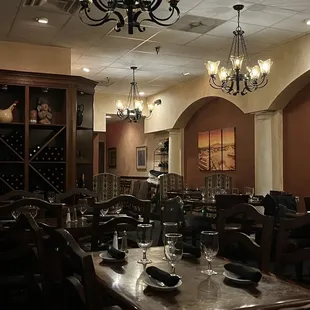 a dining room with a chandelier