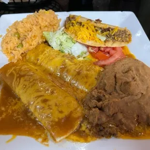Beef enchilada + 1 taco plate.