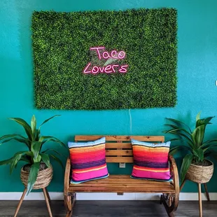 a bench with a plant on it