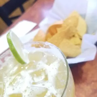 a drink with a slice of lime