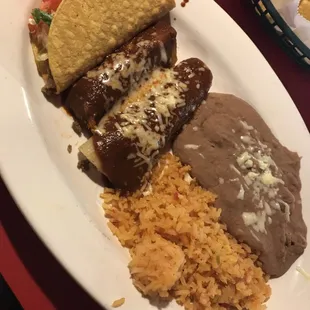 Three item combo: taco, tamale, &amp; enchilada w/ rice &amp; beans