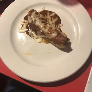 Tamale. I like them better without the chili on top.