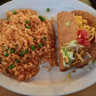Two tacos with rice