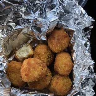 a basket of fried jalapenos