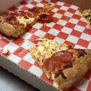 The one pepperoni pizza that I cut in half.