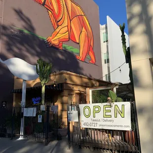 a mural of a bear on the side of a building