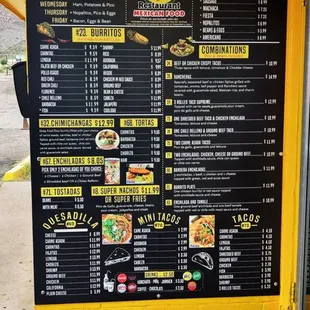 a menu on the side of a building