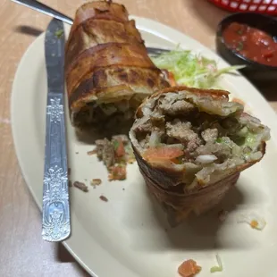 Carne Asada bacon wrapped burrito.