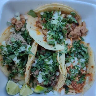 4 tacos (Al Pastor, Carnitas, Barbacoa, and spicy chicken)