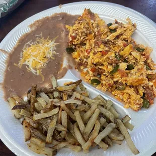 Breakfast Menu: La Mexicana w/chorizo. Substituted rice for papas. Yum!