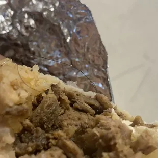 Asada burrito with a hair.