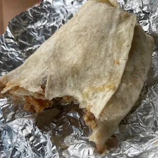 Burrito off the secret menu. Chille verde with fresh chicharrón. I highly recommend this .