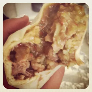 Chile verde beans, rice, jalepenos, hold the salsa. Behold: my favorite burrito in the world!
