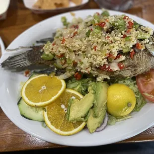 a whole fish on a plate