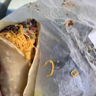 Burrito made messy, rushed, and wrapped incorrectly!!