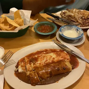 Burrito and Enchilada with salsa and Queso dip