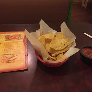 Chips, salsa and menu.