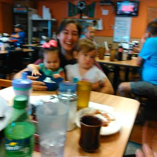 a family sitting at a table