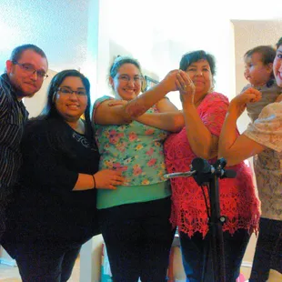 a group of people taking a selfie