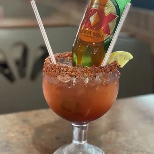 a drink in a glass with a straw