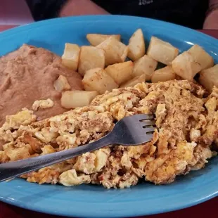 Chorizo and eggs plate.