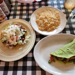 Tostada with pastor, taco with cactus, and rice