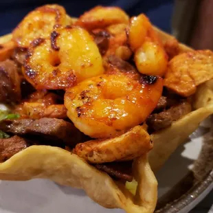 Taco salads filled with meat!