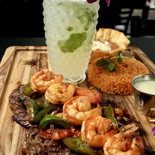 This is our amazing Steak with Shrimp along with our delicious Mojito
