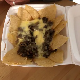 This is what you get for $13 steak Nachos Jalisco &apos;s.... would never order from here again poor quality poor everything.