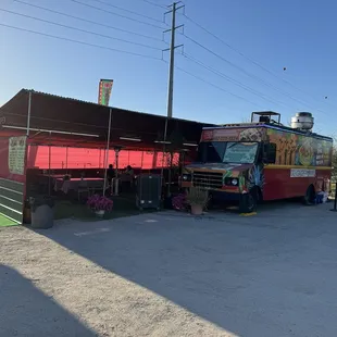 JalisTaco with a nice tented area covering tables outside the source of taco goodness.