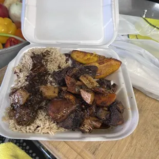a meal in a styrofoam container