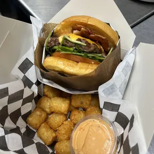 Must love bacon burger, tots and tot sauce