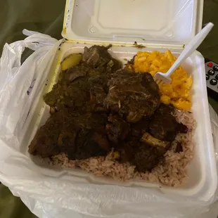 Oxtail and Goat Combo Rice and Peas Mac and Cheese