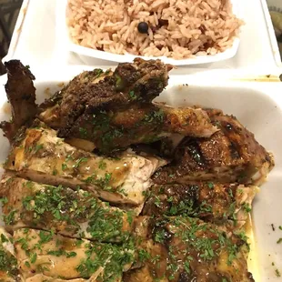 Jerk chicken with side of rice and peas