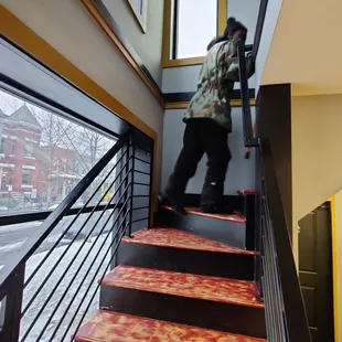 Stairway to upstairs dining area.